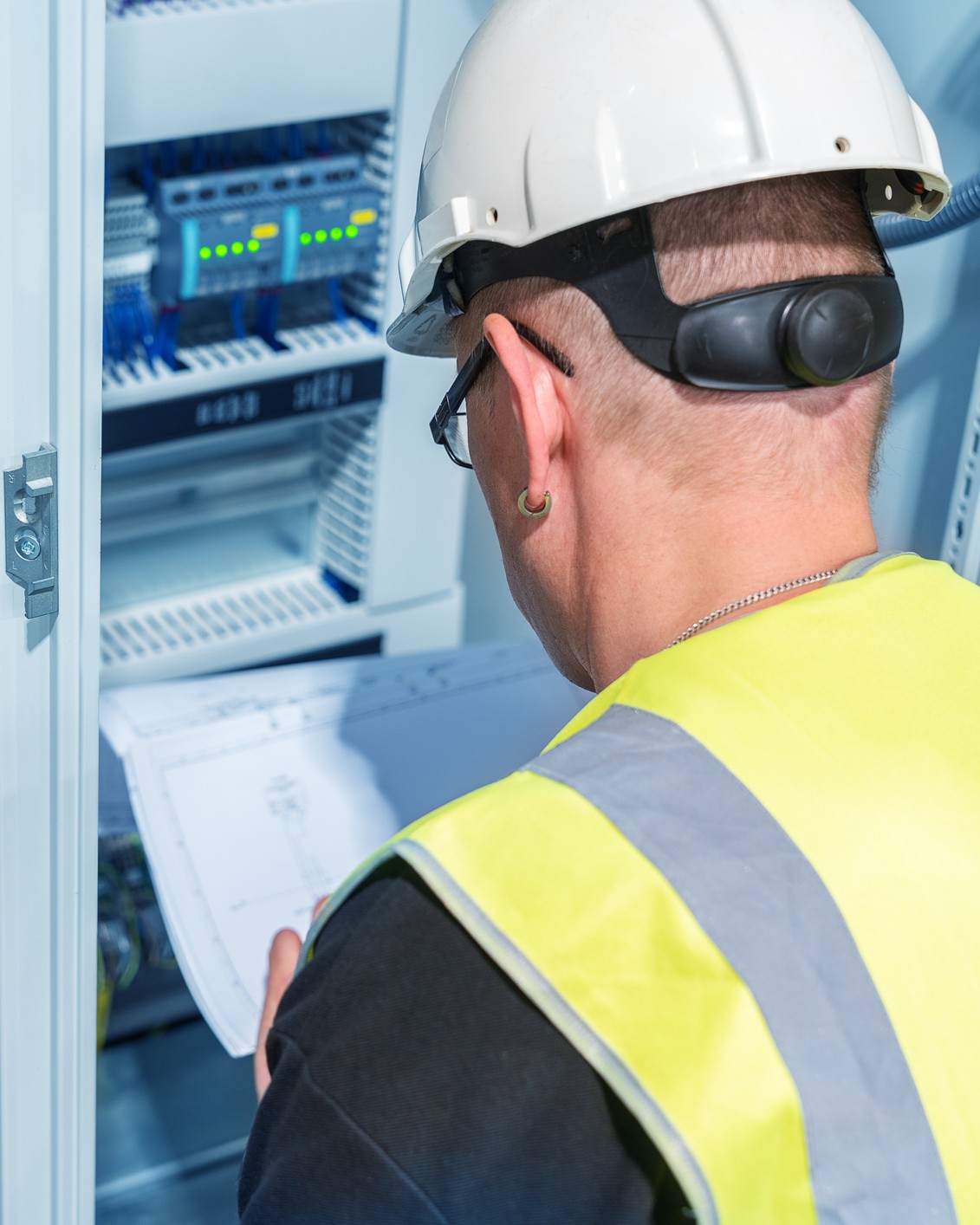 working looking at wiring plans for inside cable installation