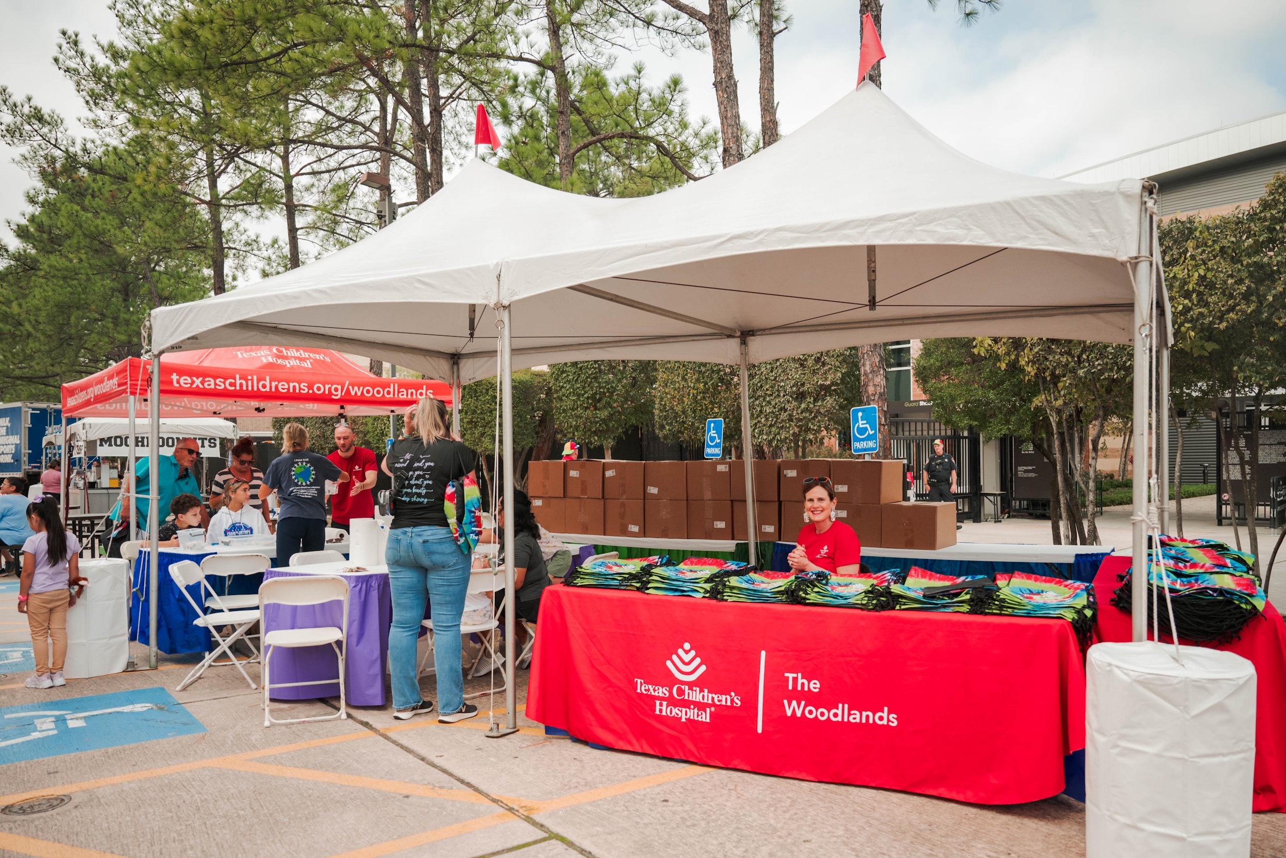 Families enjoy a hands-on sponsor activity at Children's Festival.