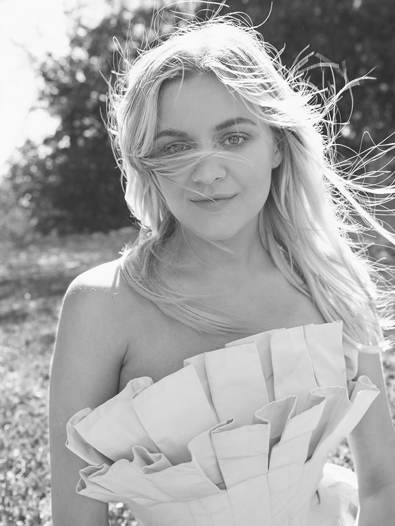 black and white photo Kelsea Ballerini outside