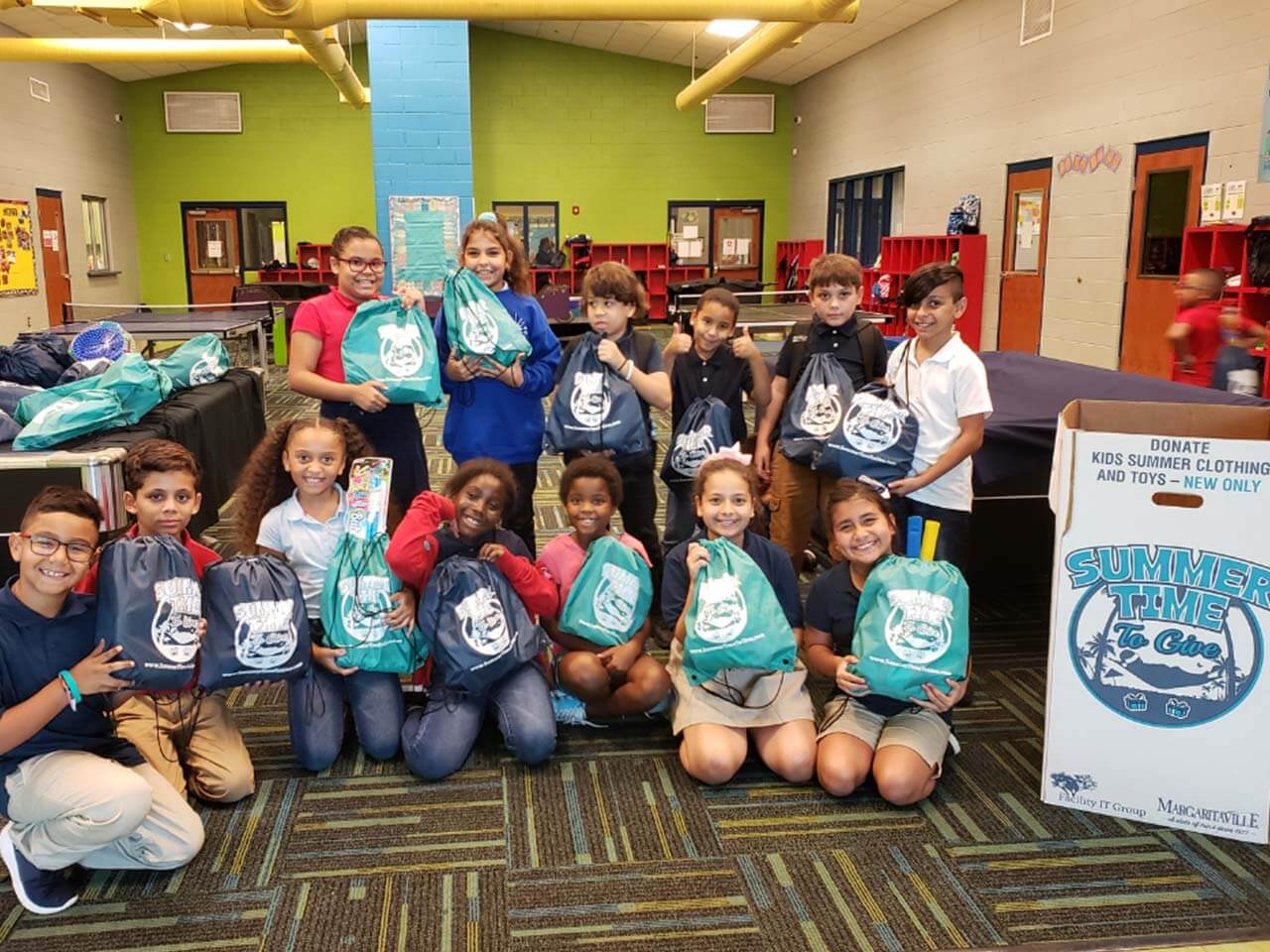 Children having a great time with their gift bags
