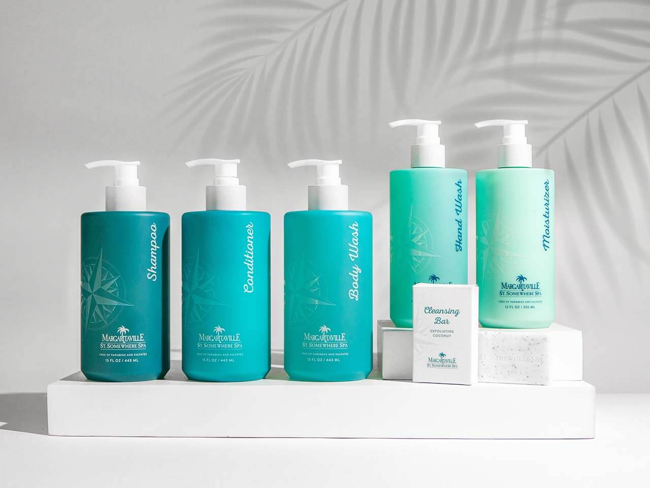 Bottles of lather lined up on a countertop