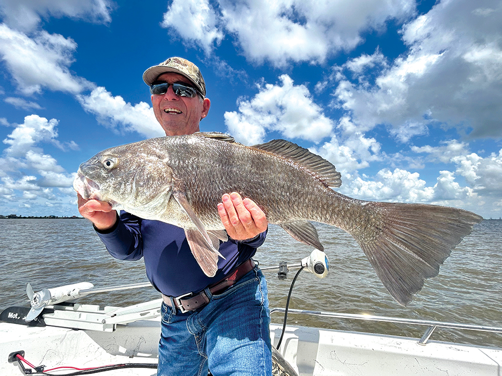 Switching target species during August can make a big difference in gaining pulls from hard-fighting fish. The big grin from Dow Gene Anderson is all the proof you need. Embrace the Suck