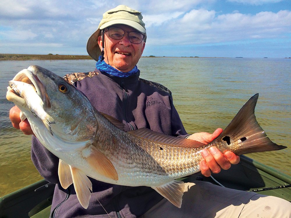 This might be the biggest Redfish ever caught our reels…