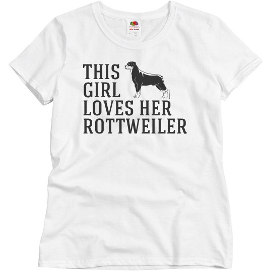 Girl loves her Rottweiler
